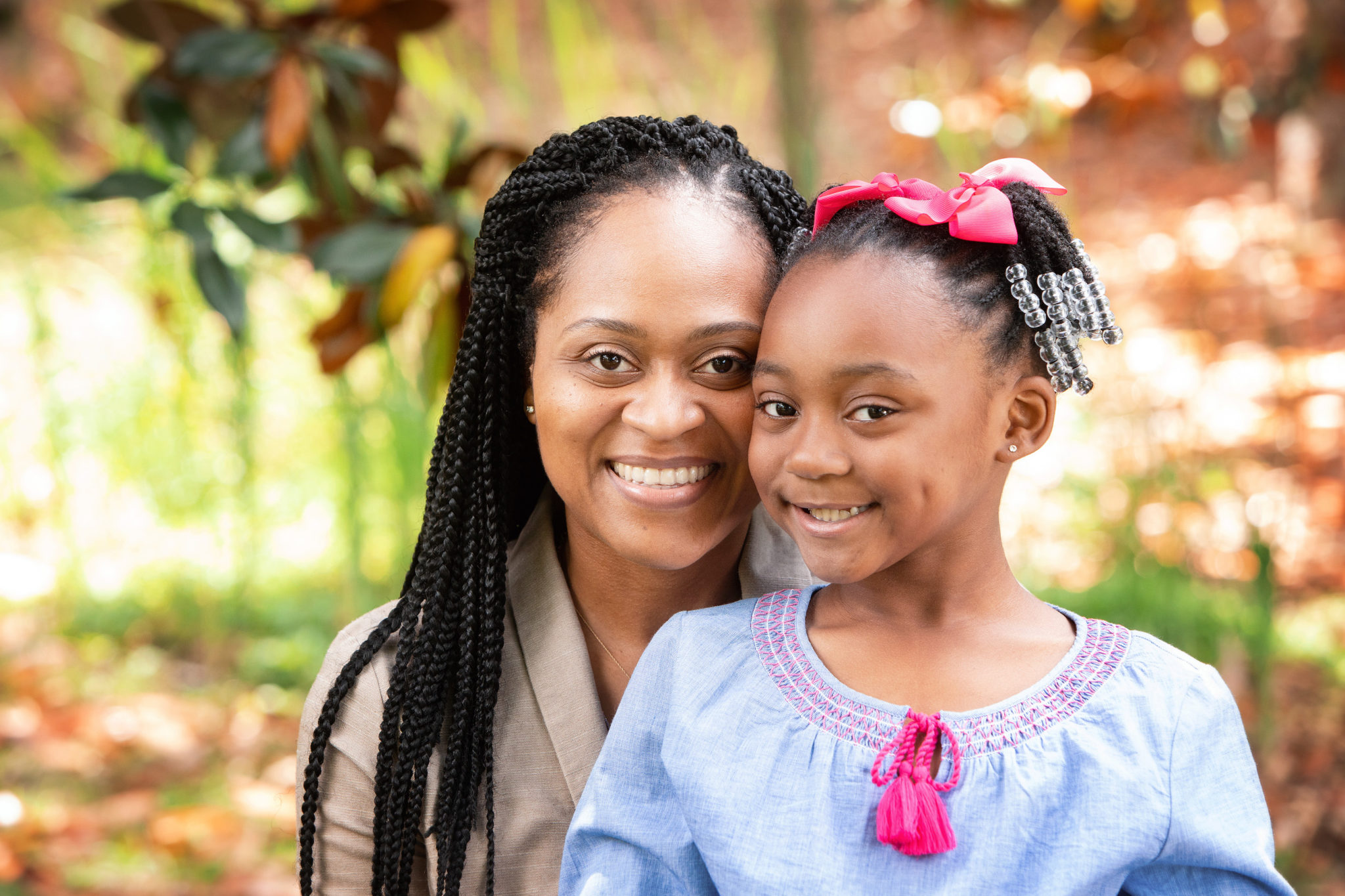 Young mother and child, white smiles, happy, mother and daughter, Spillers Orthodontics