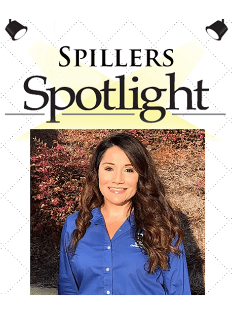 Nicole, Front Desk Coordinator, Spillers Orthodontics Spotlight, Macon and Warner Robins, young woman with black curly hair wearing blue button up