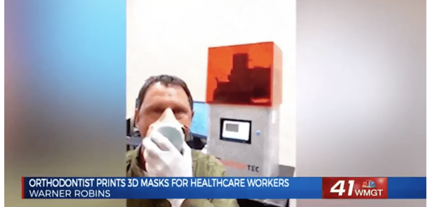 Dr. Spillers in the news, wearing mask, news segment